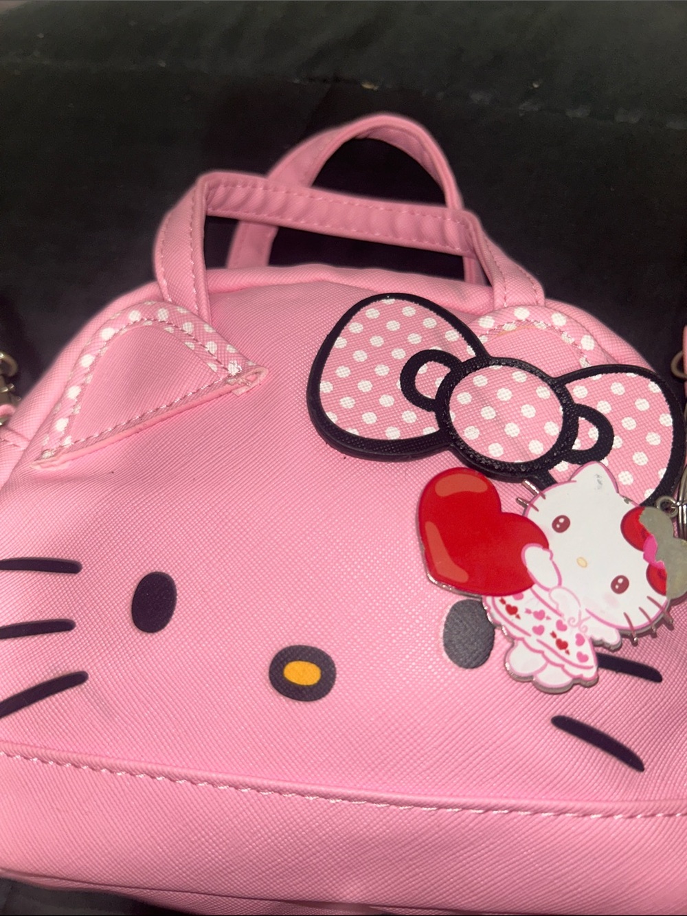Sanrio Pink Hello Kitty Face Crossbody Bag with Polka-Dot Bow Accent